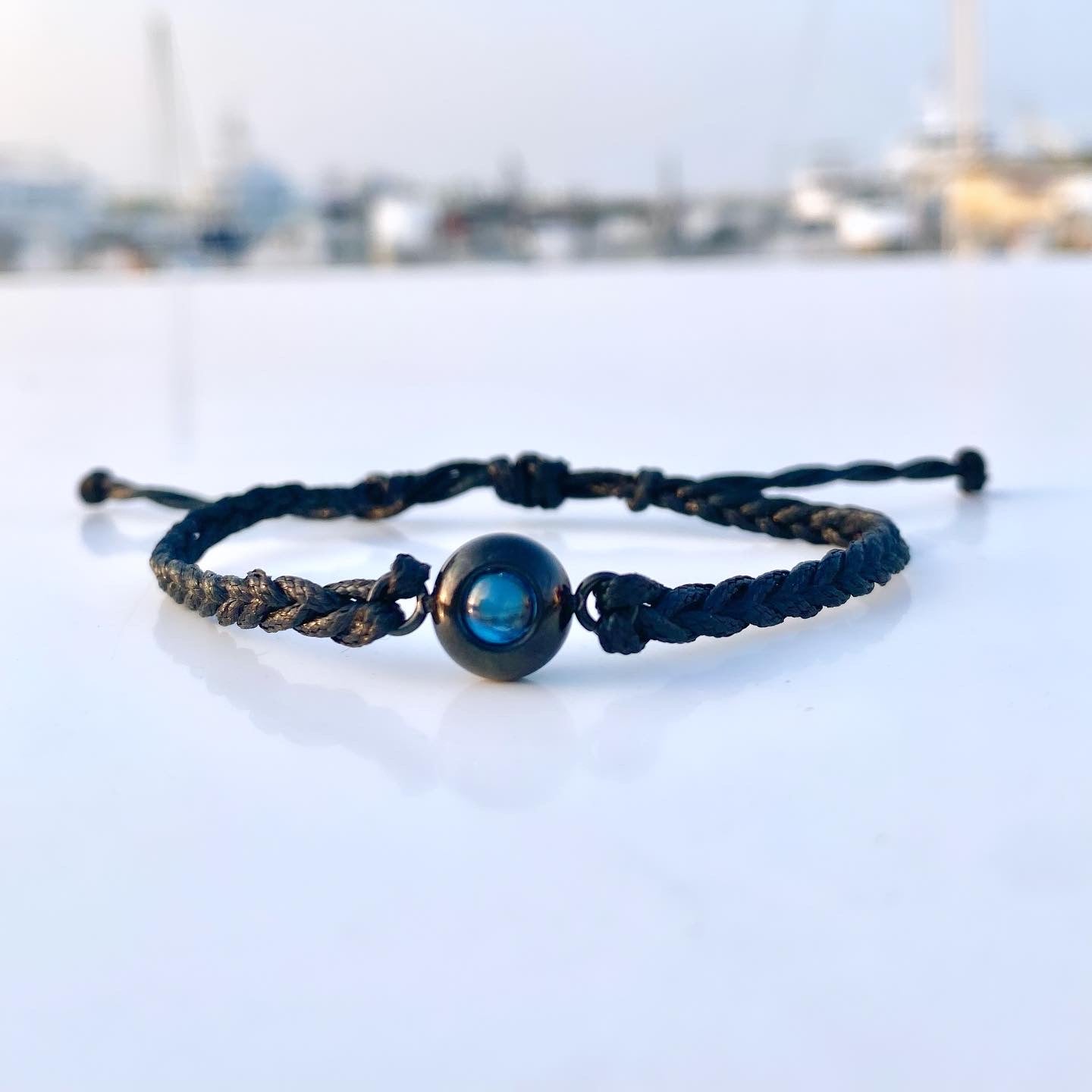 Black knit bracelet (your photo inside)